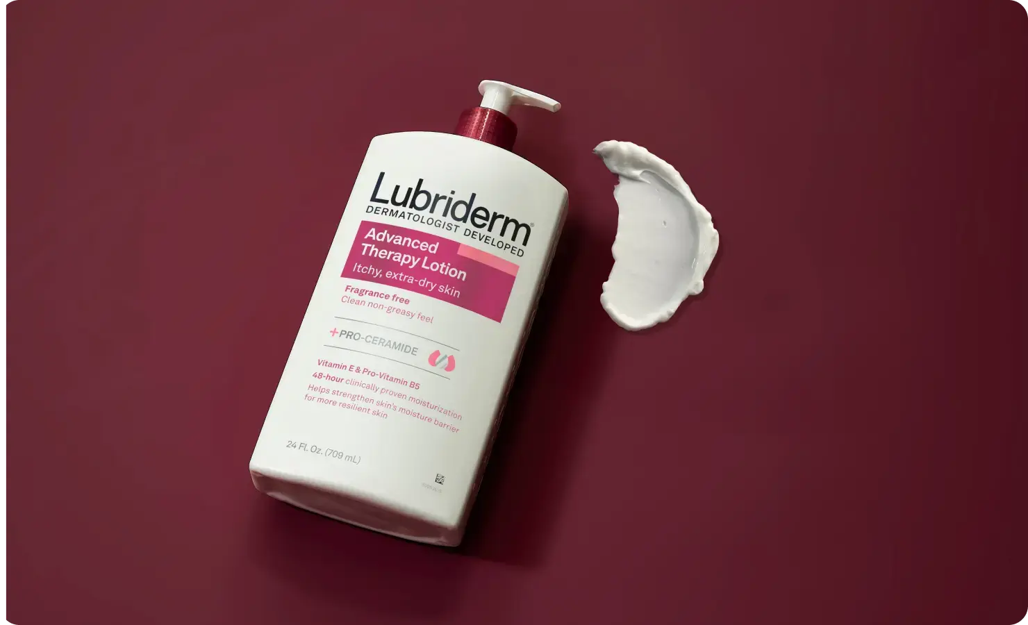 Lubriderm(R) Advanced Therapy products on dark pink background